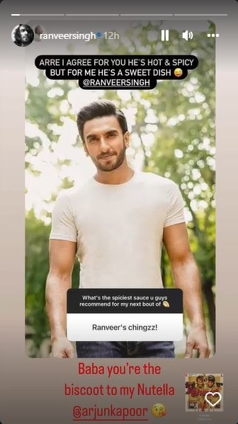 Ranveer smiled wearing a white T-shirt and blue denims.
