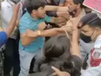 A man and two girls misbehaved with and manhandled Police and Traffic Police personnel. A man and two girls misbehaved with and manhandled Police and Traffic Police personnel.
