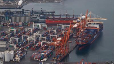 A container ship sits docked at the Port of Vancouver in Vancouver, British Columbia, Canada. (AFP/FILE)