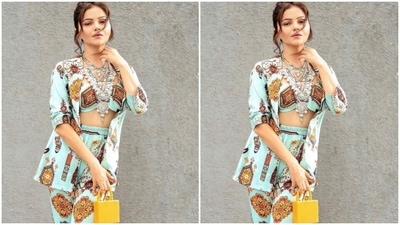 Rubina played muse to fashion designer Ankur J and picked a pastel blue co-ord set from the shelves for the designer. (Instagram/@rubinadilaik)