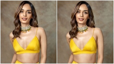 Manushi played muse to fashion designer Varun Bahl and picked a yellow lehenga for the pictures. (Instagram/@manushi_chhillar)