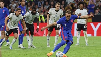 England's Harry Kane scores his side's opening goal during the UEFA Nations League soccer match between Germany and England at the Allianz Arena, in Munich. (AP)