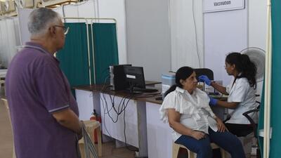 Beneficiaries receive a shot of the booster Covid vaccine at Malad, in Mumbai on Wednesday. Beneficiaries receive a shot of the booster Covid vaccine at Malad, in Mumbai on Wednesday.