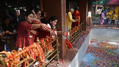 Devotees pouring milk into a sacred pond at the Kheer Bhawani Temple during an annual festival in Tulmulla on Wednesday. In the backdrop of recent targeted killings in Kashmir, a smaller number of pilgrims on Wednesday visited the temple. (ANI) Devotees pouring milk into a sacred pond at the Kheer Bhawani Temple during an annual festival in Tulmulla on Wednesday. In the backdrop of recent targeted killings in Kashmir, a smaller number of pilgrims on Wednesday visited the temple. (ANI)