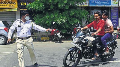 The traffic police had on May 25 issued a notification, declaring that they will take serious note of pillion riders riding without helmets and start penalising them (HT PHOTO) The traffic police had on May 25 issued a notification, declaring that they will take serious note of pillion riders riding without helmets and start penalising them (HT PHOTO)