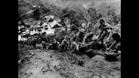 Indian troops move ammunition in muddy conditions on the road to Tamu, Burma, in 1943. (Wikimedia Commons)