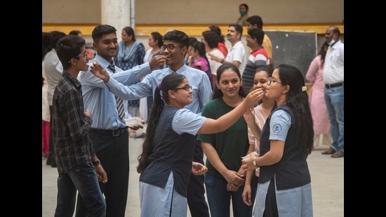 HSC students of Abhinav Junior College in Pune celebrate after results were announced on Wednesday. (Pratham Gokhale/HT Photo)
