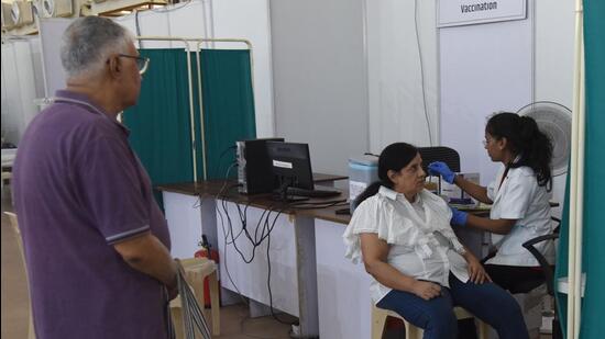 Beneficiaries receive a shot of the booster Covid vaccine at Malad, in Mumbai on Wednesday.