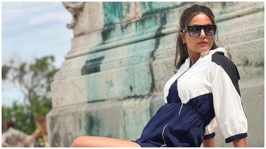 Hina wore the outfit with white chunky lace-up sneakers featuring a colourful sole in pink, blue and purple shades. She also picked tinted sunglasses with large embellished frames and dainty gold earrings for the accessories.(Instagram/@realhinakhan)