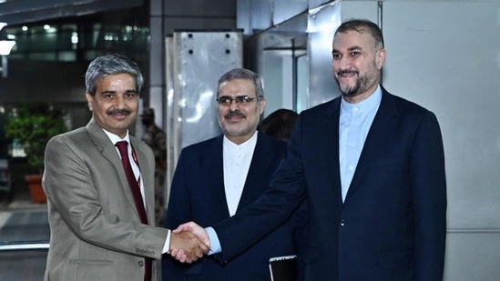 Iran foreign minister Hossein Amir-Abdollahian (right).