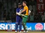 India's captain Rishabh Pant, left, reacts as he greets South Africa's David Miller to congratulate him on their win in the first Twenty20 cricket match(AP)