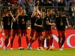 Belgium's Kevin De Bruyne celebrates scoring their second goal with teammates