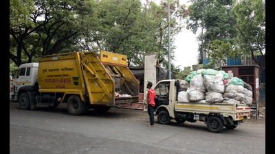 Garbage carrying trucks seen transporting waste at Hadapsar Industrial area on Thursday. (Shankar Narayan/HT PHOTO) Garbage carrying trucks seen transporting waste at Hadapsar Industrial area on Thursday. (Shankar Narayan/HT PHOTO)