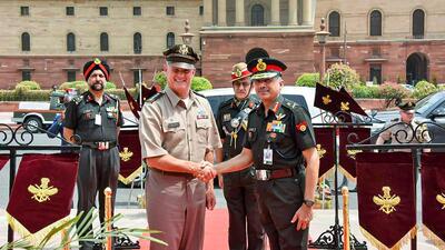 Indian Army vice-chief Lt General Baggavalli Somashekar Raju (right) welcomes Commanding General United States Army Pacific of US Army Pacific, General Charles A Flynn upon his arrival at the South Block, in New Delhi. (PTI) Indian Army vice-chief Lt General Baggavalli Somashekar Raju (right) welcomes Commanding General United States Army Pacific of US Army Pacific, General Charles A Flynn upon his arrival at the South Block, in New Delhi. (PTI)