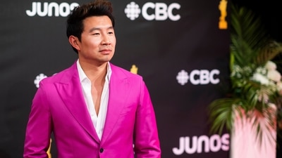 Simu Liu arrives at the JUNO Awards on Sunday, May 15, 2022, at the Budweiser Stage in Toronto. (Photo by Arthur Mola/Invision/AP) (Arthur Mola/Invision/AP) Simu Liu arrives at the JUNO Awards on Sunday, May 15, 2022, at the Budweiser Stage in Toronto. (Photo by Arthur Mola/Invision/AP) (Arthur Mola/Invision/AP)