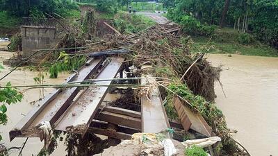 Two timber bridges over the Bandra river at Morop Bajar and another at Makalgonchu washed away due to the flash flood caused by heavy rainfall, in West Garo Hills on Thursday. (ANI) Two timber bridges over the Bandra river at Morop Bajar and another at Makalgonchu washed away due to the flash flood caused by heavy rainfall, in West Garo Hills on Thursday. (ANI)