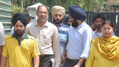 The accused, Harpal Singh (centre) and Salinder Singh (left), being produced in court in Mohali on Thursday. (HT Photo) The accused, Harpal Singh (centre) and Salinder Singh (left), being produced in court in Mohali on Thursday. (HT Photo)