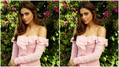 Styled by hairstylist Shefali, Aamna wore her tresses open in soft wavy curls with a middle part. Assisted by makeup artist Tushar Gupta, Aamna decked up in pink eyeshadow, mascara-laden eyelashes, contoured cheeks and a shade of nude lipstick. (Instagram/@aamnasharifofficial)