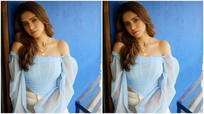 Aamna’s fashion diaries are a treat for sore eyes. A day back, Aamna aced yet another summer look in a off-shoulder pastel blue cropped top and a pair of ivory white trousers. (Instagram/@aamnasharifofficial)