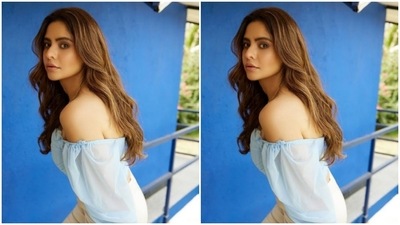 In multiple golden neck chains, Aamna minimally accessorised her summer look and opted for a minimal makeup look to complement her attire. (Instagram/@aamnasharifofficial)