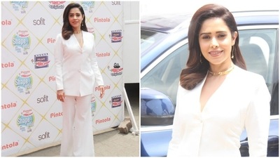 Nushrratt Bharuccha, on the other hand, chose an all-white pristine look for the shooting schedule. The star donned a white blazer-style top featuring long sleeves, a plunging V neckline, padded shoulders and a silhouette-hugging fit. (HT Photo/Varinder Chawla) Nushrratt Bharuccha, on the other hand, chose an all-white pristine look for the shooting schedule. The star donned a white blazer-style top featuring long sleeves, a plunging V neckline, padded shoulders and a silhouette-hugging fit. (HT Photo/Varinder Chawla)