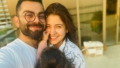 Anushka Sharma and Virat Kohli with daughter Vamika. Anushka Sharma and Virat Kohli with daughter Vamika.