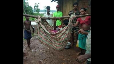 Murbad villagers carry patients up and down the hillocks on their backs or makeshift cloth stretchers (in pic). They have demanded ambulances and proper access roads to transport patients to hospitals and back. (HT PHOTO)