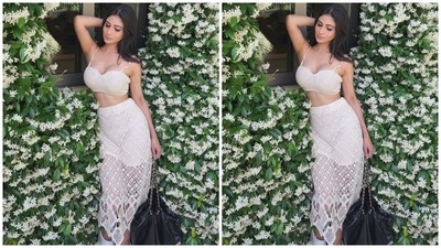 Mouni posted the pictures of herself in the ensemble with the caption, "Loving, living, walking my path, loving the journey." She served sultry summer style tips in the outfit. If you are on the lookout for a fit to go on a beach outing with your friends, Mouni's look should be your inspiration. (Instagram/@imouniroy) Mouni posted the pictures of herself in the ensemble with the caption, "Loving, living, walking my path, loving the journey." She served sultry summer style tips in the outfit. If you are on the lookout for a fit to go on a beach outing with your friends, Mouni's look should be your inspiration. (Instagram/@imouniroy)