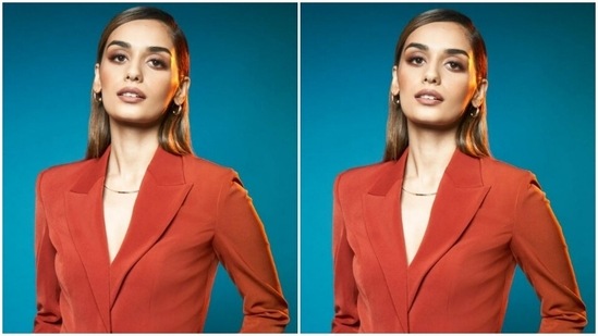 Styled by fashion stylist Sheefa J Gilani, Manushi wore her tresses open in straight locks with a side part and decked up in nude eyeshadow, black eyeliner, mascara-laden eyelashes, drawn eyebrows, contoured cheeks and a shade of nude lipstick.(Instagram/@manushi_chhillar)