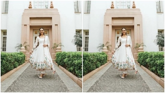 Manushi teamed a white salwar with patterns in green at the borders with a pair of white trousers with wide legs and a satin white dupatta. The salwar suit also featured zari details at the borders.(Instagram/@manushi_chhillar)