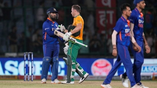 India's captain Rishabh Pant, left, shakes hands with South Africa's David Miller to congratulate him on their win in the first Twenty20 cricket match between India and South Africa in New Delhi, India(AP)