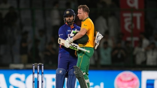 India's captain Rishabh Pant, left, reacts as he greets South Africa's David Miller&nbsp;(AP)