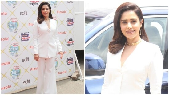 Nushrratt Bharuccha, on the other hand, chose an all-white pristine look for the shooting schedule. The star donned a white blazer-style top featuring long sleeves, a plunging V neckline, padded shoulders and a silhouette-hugging fit.(HT Photo/Varinder Chawla)