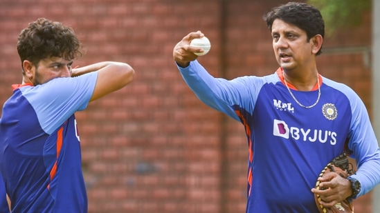 Indian cricket team's spin bowling coach Sairaj Bahutule with player Kuldeep Yadav(PTI) Indian cricket team's spin bowling coach Sairaj Bahutule with player Kuldeep Yadav(PTI)