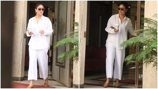 Kareena's shirt features wide collars, a front V slit on the neckline, long sleeves with cuffed wrists, droopy shoulders and a loosely fitted silhouette. The U shaped hemline on both sides added an uber-cool element to her look.(HT Photo/Varinder Chawla)