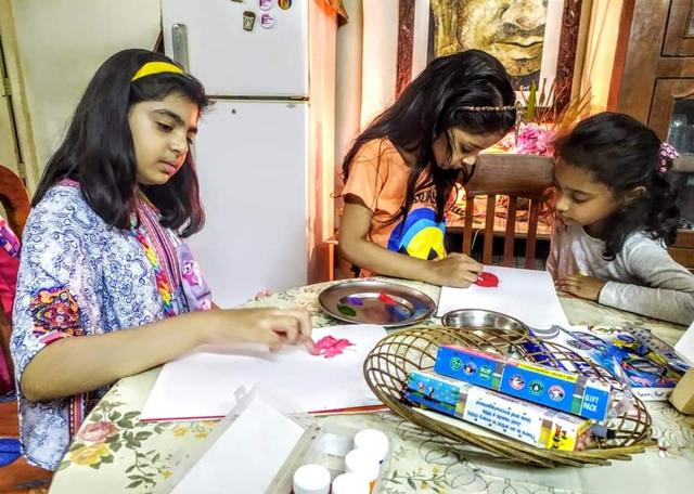 Kids participating at a painting camp.