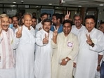 Rajasthan Chief Minister Ashok Gehlot with the Congress candidates and others flashes the victory sign during the Rajya Sabha election in Jaipur, on Friday. (PTI) Rajasthan Chief Minister Ashok Gehlot with the Congress candidates and others flashes the victory sign during the Rajya Sabha election in Jaipur, on Friday. (PTI)