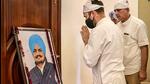 Congress leader Rahul Gandhi pays tribute during his visit to family of late singer and Congress leader Sidhu Moosewala, in Mansa, Punjab, India. (PTI) Congress leader Rahul Gandhi pays tribute during his visit to family of late singer and Congress leader Sidhu Moosewala, in Mansa, Punjab, India. (PTI)