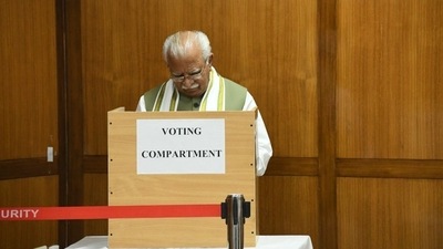 Haryana CM ML Khattar casts his vote in Rajya Sabha elections. Haryana CM ML Khattar casts his vote in Rajya Sabha elections.