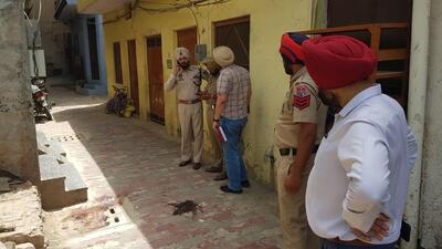 Police at the crime spot in Dera Bassi on Friday. (HT Photo) Police at the crime spot in Dera Bassi on Friday. (HT Photo)