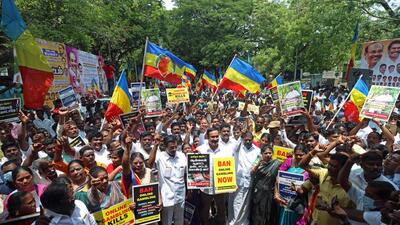 Pattali Makkal Katchi (PMK) chief Anbumani Ramadoss with party supporters holding placards raise slogans during a protest demanding a ban on online gambling in Chennai on Friday. (ANI) Pattali Makkal Katchi (PMK) chief Anbumani Ramadoss with party supporters holding placards raise slogans during a protest demanding a ban on online gambling in Chennai on Friday. (ANI)
