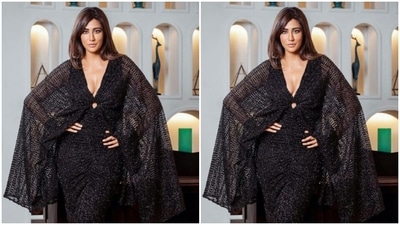 Chitrangda's black shimmery gown featured bodycon details till the ankles. It added more sass to her look with a dramatic cape around her shoulders with a plunging neckline. (Instagram/@chitrangda)