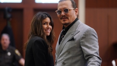Johnny Depp and his attorney Camille Vasquez look on during his defamation case against ex-wife, actor Amber Heard at Fairfax County Circuit Court in Fairfax, Virginia, U.S., May 19, 2022. Shawn Thew/Pool via REUTERS (REUTERS)