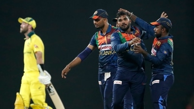 Sri Lanka's Wanindu Hasaranga de Silva celebrates the dismissal of Australia's Glenn Maxwell with teammates during the second Twenty20 cricket match between Sri Lanka and Australia in Colombo, Sri Lanka, Wednesday, June 8, 2022. (AP)