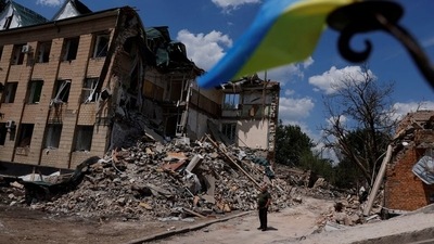 Press officer Olexii Mischenko shows a destroyed city administration building in Bashtanka, Mykolaiv region, as Russia's attack on Ukraine continues, Ukraine. (REUTERS)
