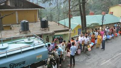 Residents queue up to collect drinking water from a tanker in Shimla when a similar crisis hit the tourist town in May 2018. (PTI file photo) Residents queue up to collect drinking water from a tanker in Shimla when a similar crisis hit the tourist town in May 2018. (PTI file photo)
