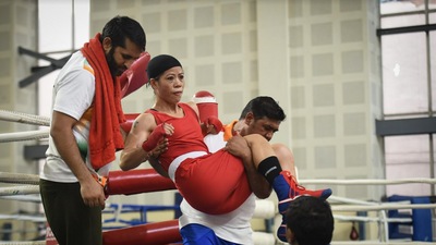 Mary Kom being carried off the ring (HT Photo)