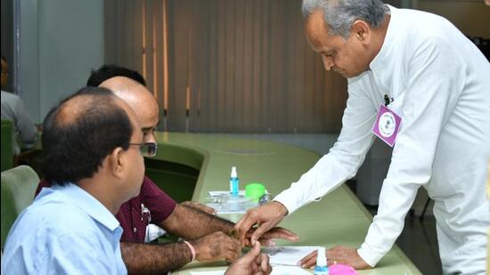 Rajasthan chief minister Ashok Gehlot casts his vote during the Rajya Sabha elections on Friday. (HT Photo)