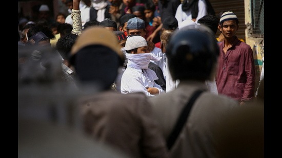 Protestors clash with police during a protest demanding the arrest of Bharatiya Janata Party (BJP) member Nupur Sharma for her comments on Prophet Mohammed, in Prayagraj, India, June 10, 2022 (REUTERS)