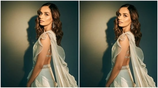 Manushi’s fashion diaries are goals for us. A few days back, the actor picked a frilled white saree from the shelves of fashion designer Ridhi Mehra and slayed ethnic goals in it.(Instagram/@manushi_chhillar)